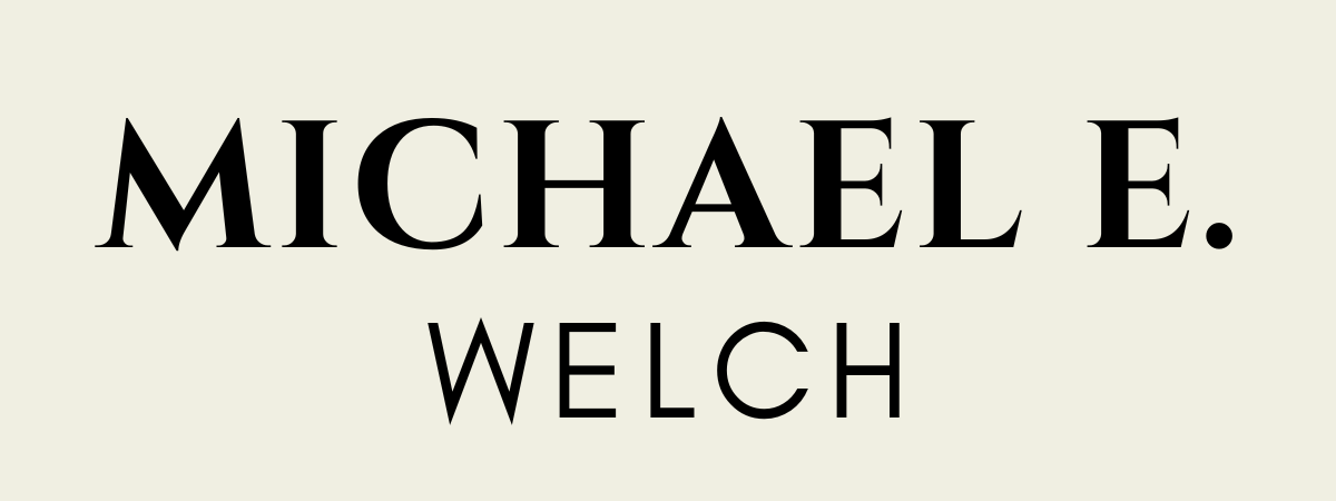 Michael E. Welch logo